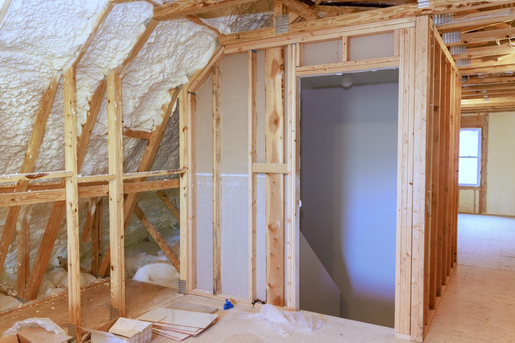 spray foam insulation is used to insulate wall of an under construction site
